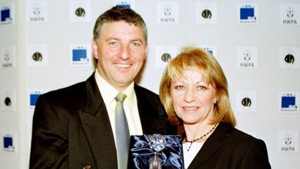 Anne Grossick with her husband John after being named horse racing photographer of the year in 2001