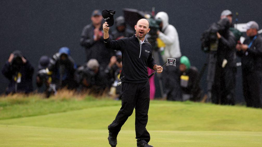 Brian Harman waves to the Hoylake galleries after becoming Open champion