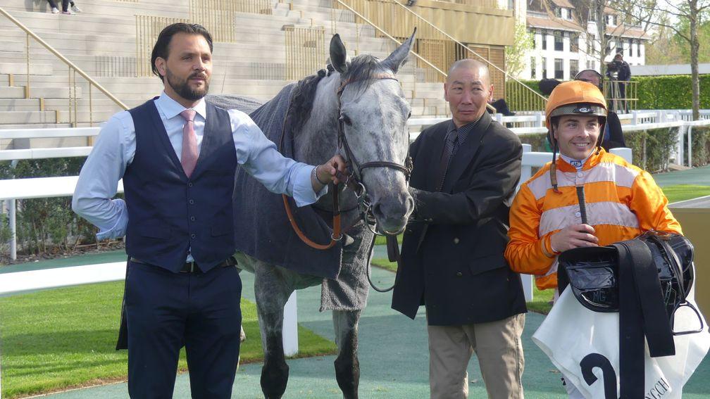 Maxime Guyon poses with Skalleti after victory in the Prix d'Harcourt at Longchamp