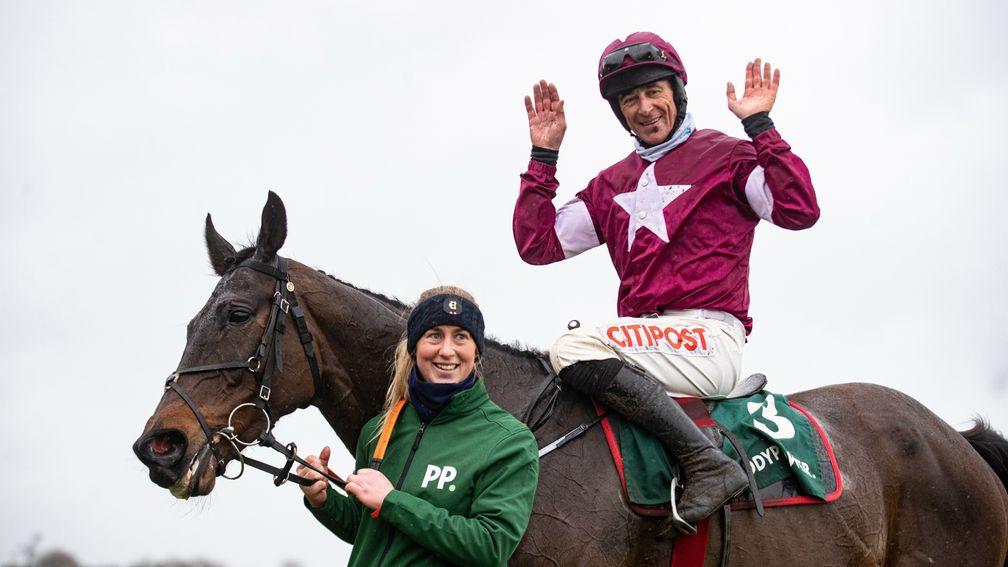 All smiles: Davy Russell and Camilla Sharples celebrated Conflated's upset win