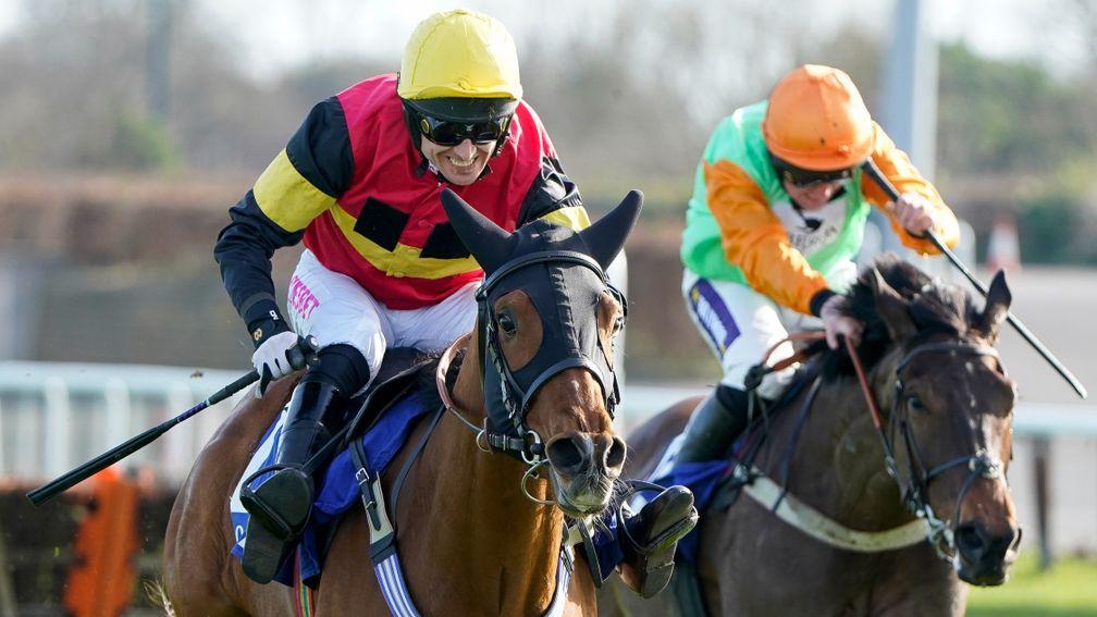 SUNBURY, ENGLAND - FEBRUARY 26: Paddy Brennan riding Knight Salute (yellow cap) clear the last to win The Coral Adonis Juvenile Hurdle at Kempton Park Racecourse on February 26, 2022 in Sunbury, England. (Photo by Alan Crowhurst/Getty Images)