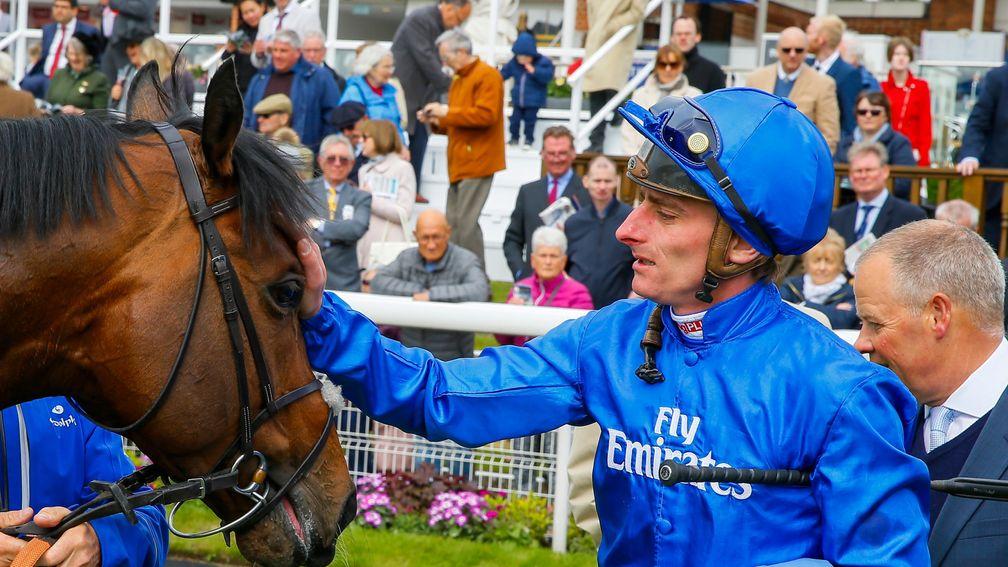 Adam Kirby: gives Harry Angel a pat after winning the Duke Of York