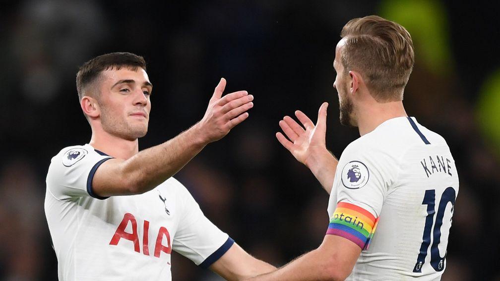 Harry Kane embraces Tottenham Hotspur teammate Troy Parrott