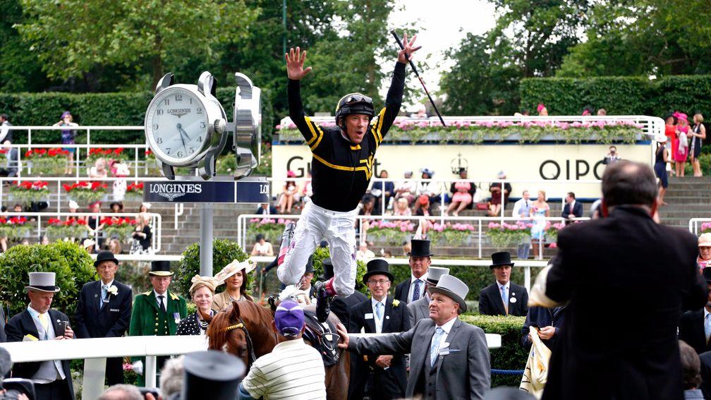 Frankie Dettori executes his famous flying dismount after victory on Undrafted