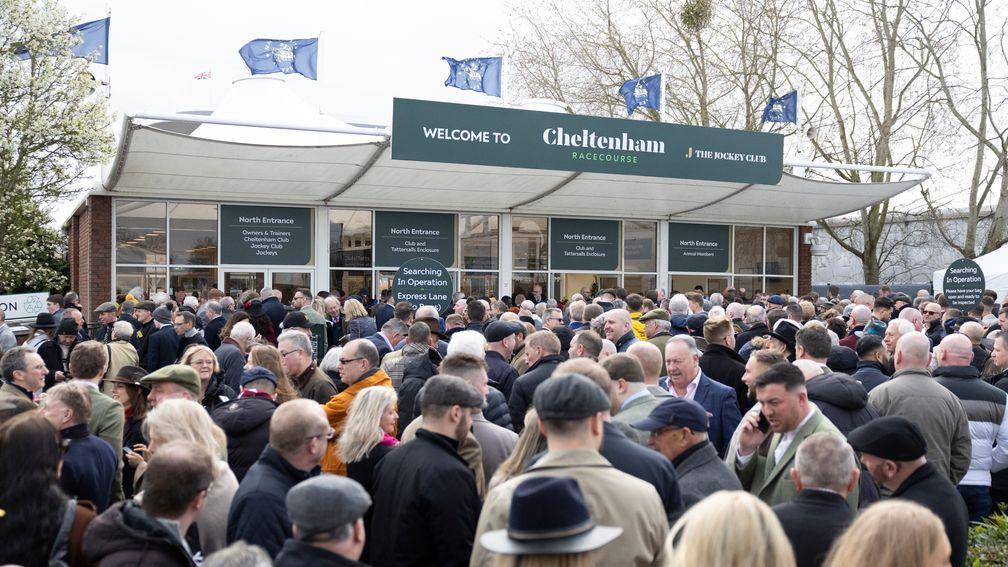 Cheltenham racegoers wait at the gates for Gold Cup day
