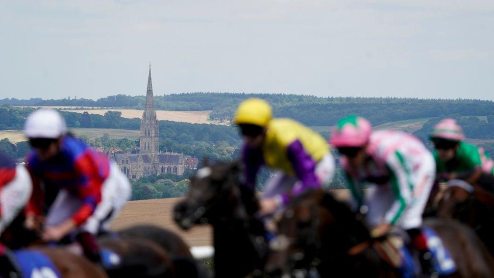 Boafo Boy (pink and green silks): on his way to victory at Salisbury, with the city's cathedral in the background