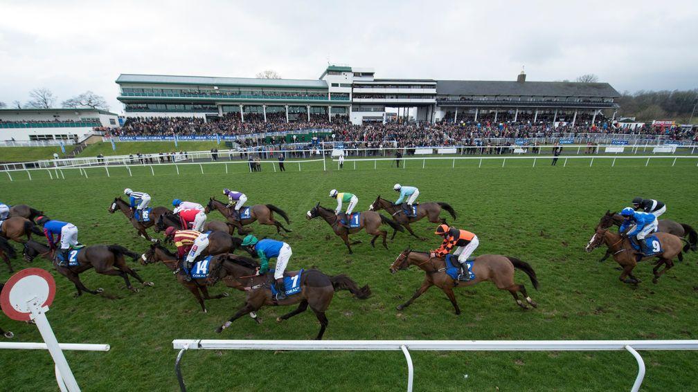Last year's Coral Welsh Grand National field start the last circuit with winner Raz De Maree (James Bowen in blue, no9) towards the rear