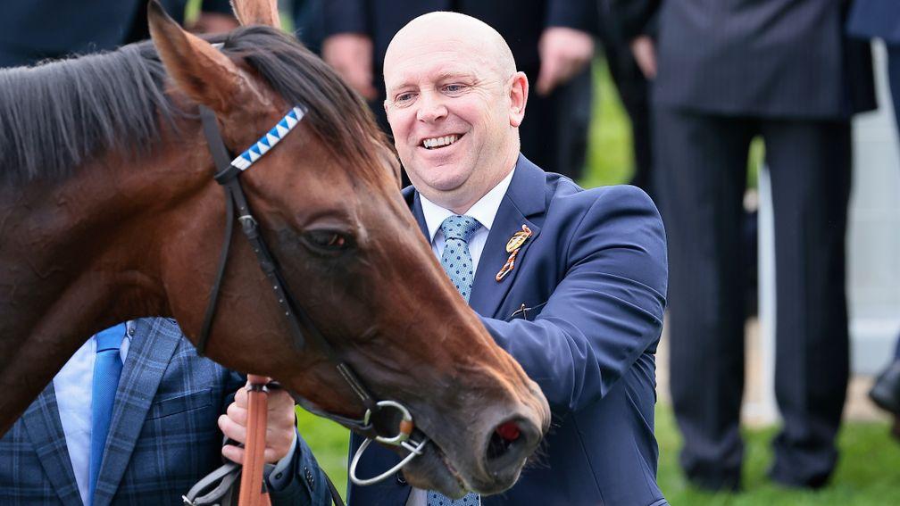 Hukum with trainer Owen Burrows after winning the Dahlbury Coronation Cup at Epsom