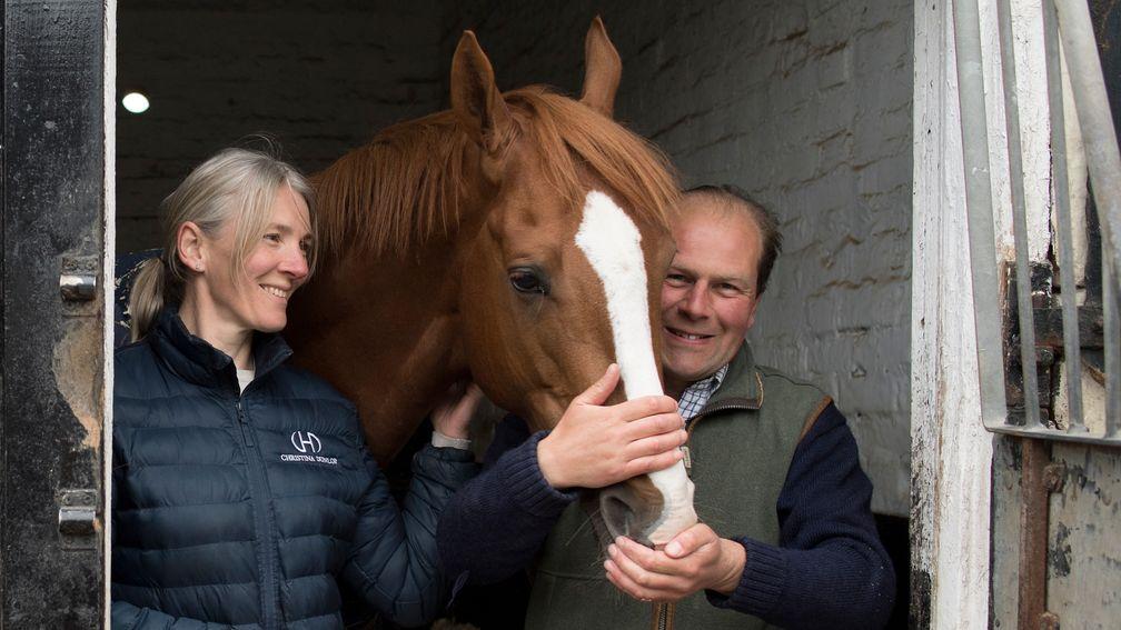 Robin Of Navan and Christina Dunlop, pictured with trainer Harry Dunlop, are safely in Hong Kong