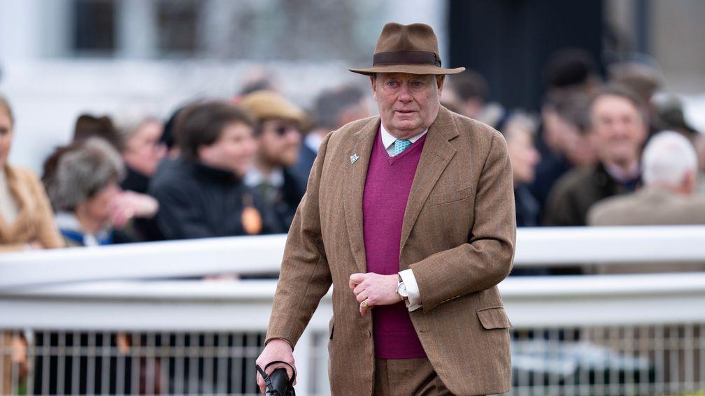 A despondent Nicky Henderson enters the paddock before Wednesday's opening race
