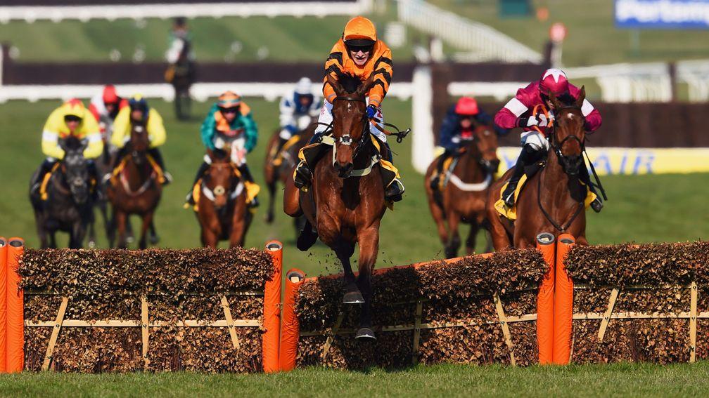 Thistlecrack leads last year's race from Alpha Des Obeaux (right)