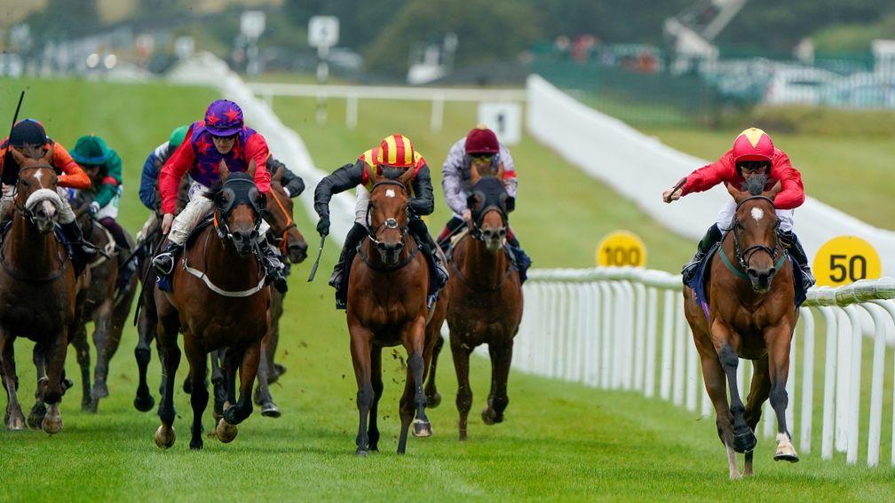 KILDARE, IRELAND - SEPTEMBER 11: Jason Hart riding Highfield Princess (R, red) win The Al Basti Equiworld, Dubai Flying Five Stakes at Curragh Racecourse on September 11, 2022 in Kildare, Ireland. (Photo by Alan Crowhurst/Getty Images)