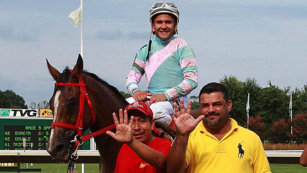 Jorge Navarro (right) celebrates five wins in one day at Monmouth Park in July 2017