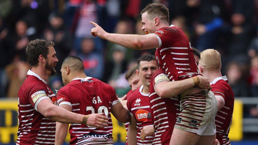 Wigan celebrate their Good Friday success over St Helens