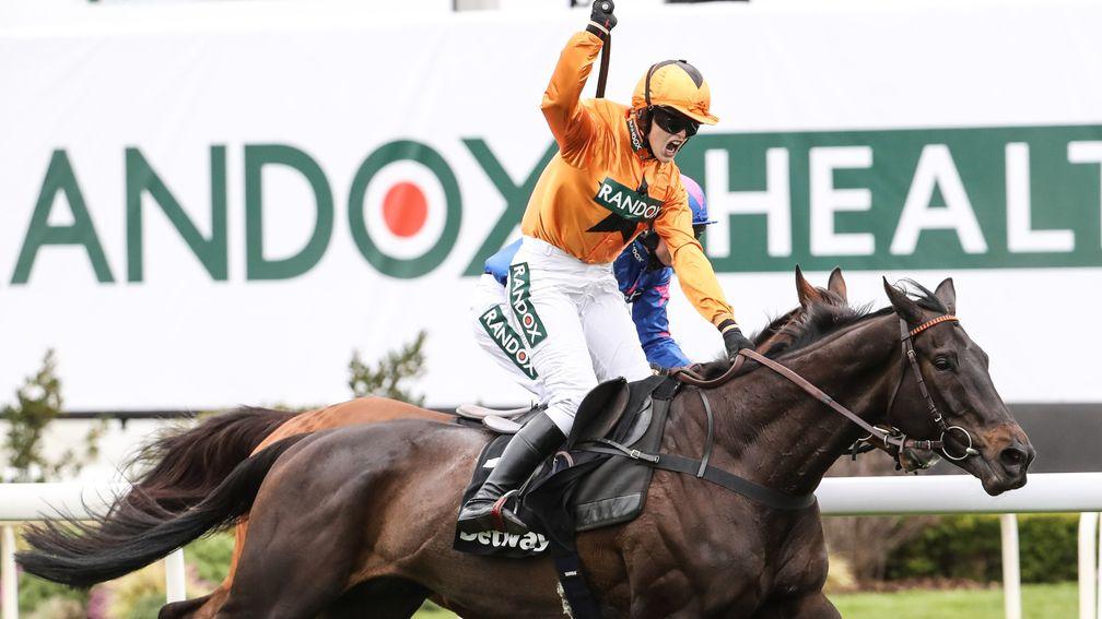 Lizzie Kelly celebrates as Tea For Two edges out Cue Card in the Betway Bowl at Aintree