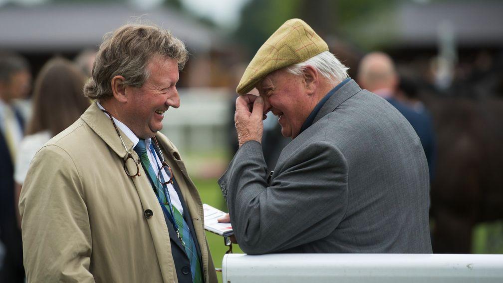 Easterby sharing a joke with Britain's winningmost trainer Mark Johnston