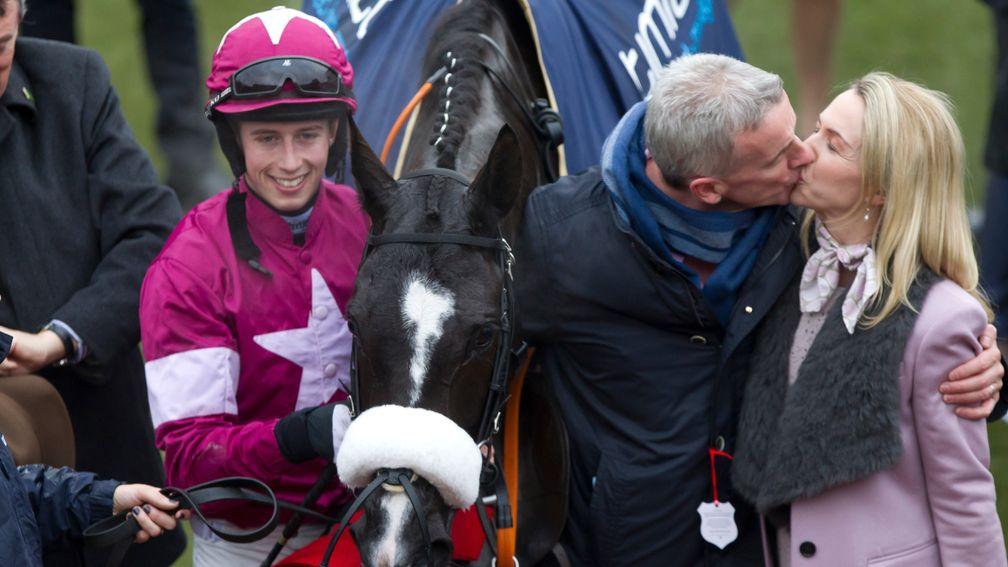 Michael O'Leary, seen here kissing his wife Anita in the aftermath of the 2016 Gold Cup, said having a winner at Cheltenham is 'as close as fat, old, middle-aged men get to playing in the Premier League'