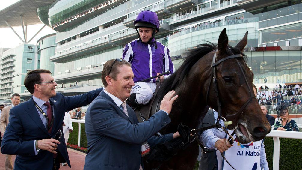 Victory parade: Mendelssohn and Ryan Moore are greeted by Aidan O'Brien and Pat Keating after storming to victory in the UAE Derby