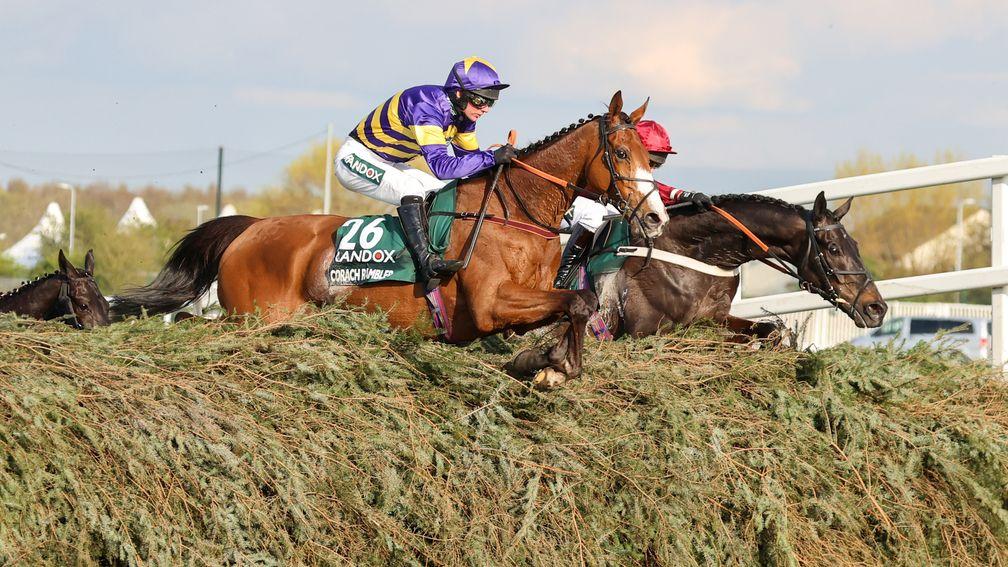 Corach Rambler clears a National fence on his way to glory