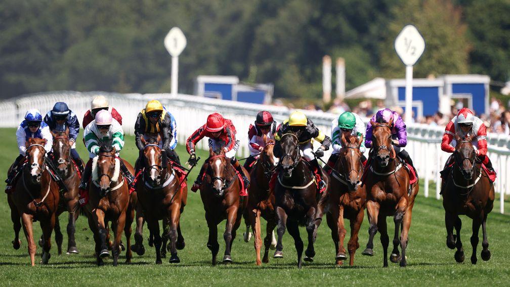 ASCOT, ENGLAND - JULY 09: Tom Marquand rides Mountain Peak (purple cap, R) to win The Betfred Heritage Handcap Stakes at Ascot Racecourse on July 09, 2022 in Ascot, England. (Photo by Charlie Crowhurst/Getty Images)