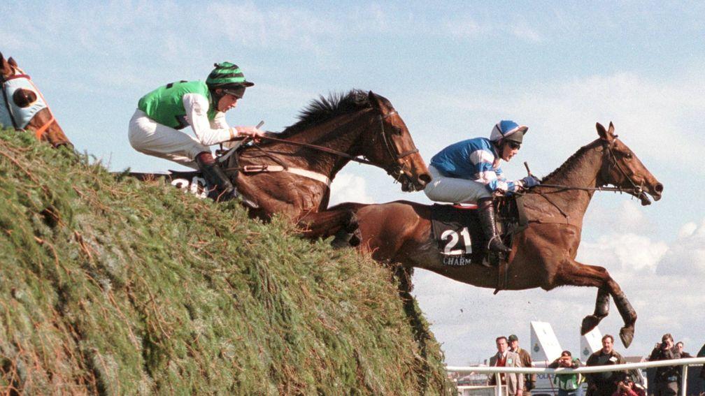 Blue Charm and jockey Lorcan Wyer lead the field over The Chair in the Grand National at Aintree