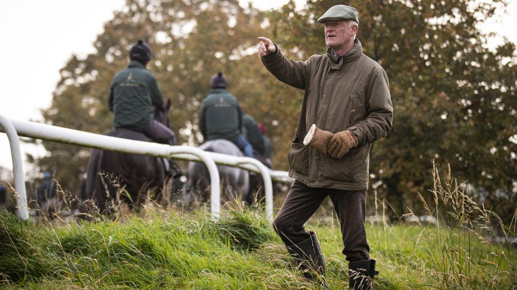Willie Mullins talking to his riders during morning gallops