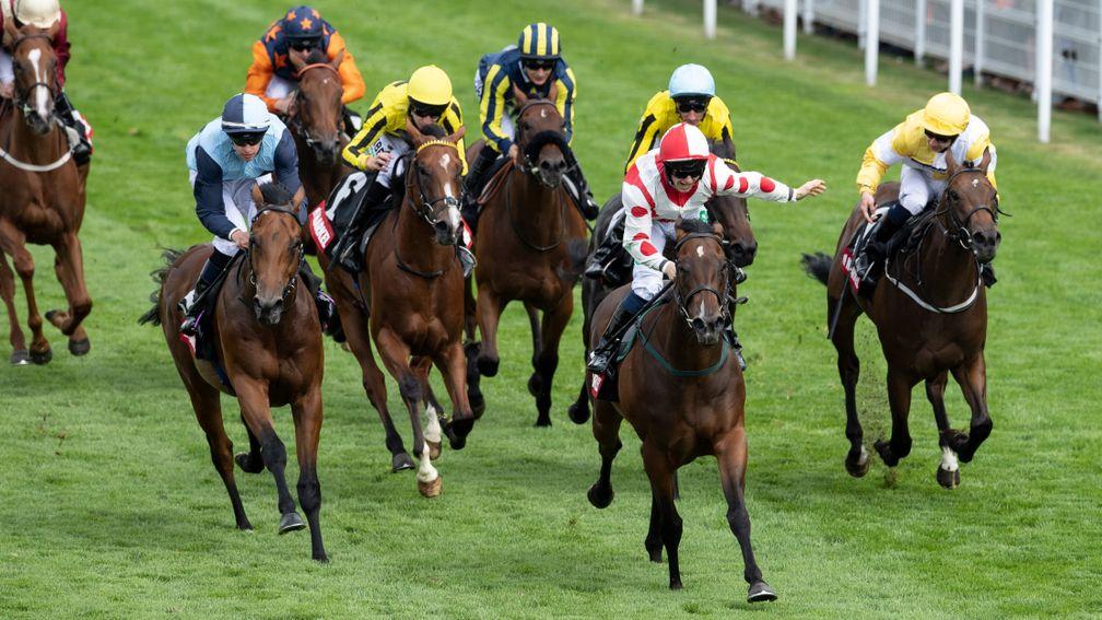 Liberty Beach and Jason Hart (centre) land the Group 3 Molecomb Stakes at Glorious Goodwood