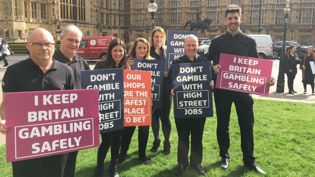 Jennings Bet staff, with Vicky Knight third left, join the demonstration at Westminster