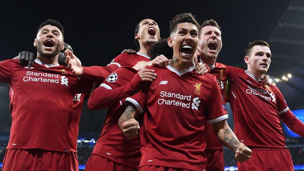 Liverpool's Roberto Firmino celebrates scoring the second goal against Man City