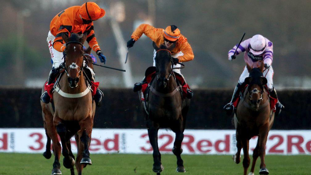 Celebration time: Tom Scudamore takes it easy aboard Thistlecrack, the rst novice winner of the King George