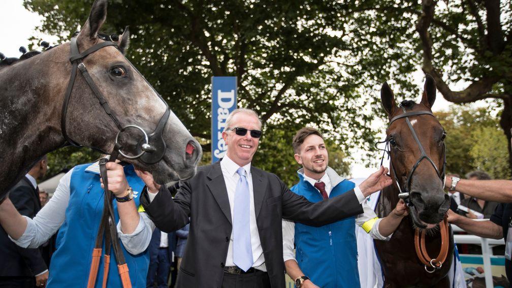 Karl Burke poses with Havana Grey (2nd) and Unfortunately (1st) after saddling the 1-2 in Sunday's Darley Prix Morny at Deauville