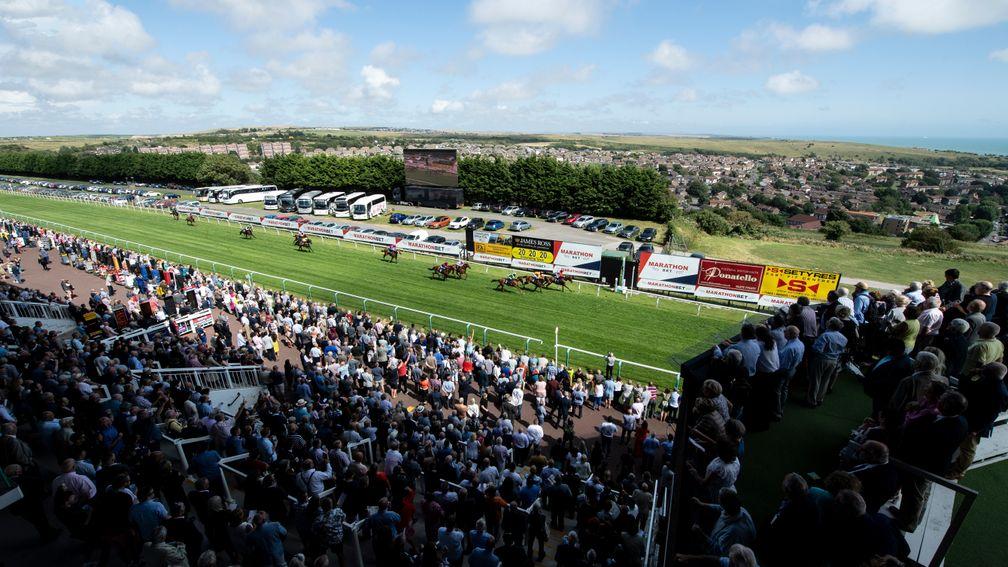 Racegoers enjoy a day in the sun during happier times for Brighton racecorse