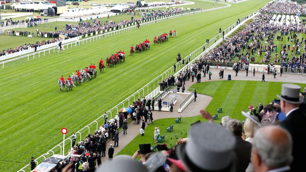 ASCOT, ENGLAND - JUNE 14:  The Royal Procession arriving by carriage as seen from the Royal Enclosure, Level 4 on day 1 of Royal Ascot at Ascot Racecourse on June 14, 2016 in Ascot, England.  (Photo by Tristan Fewings/Getty Images for Ascot Racecourse)
