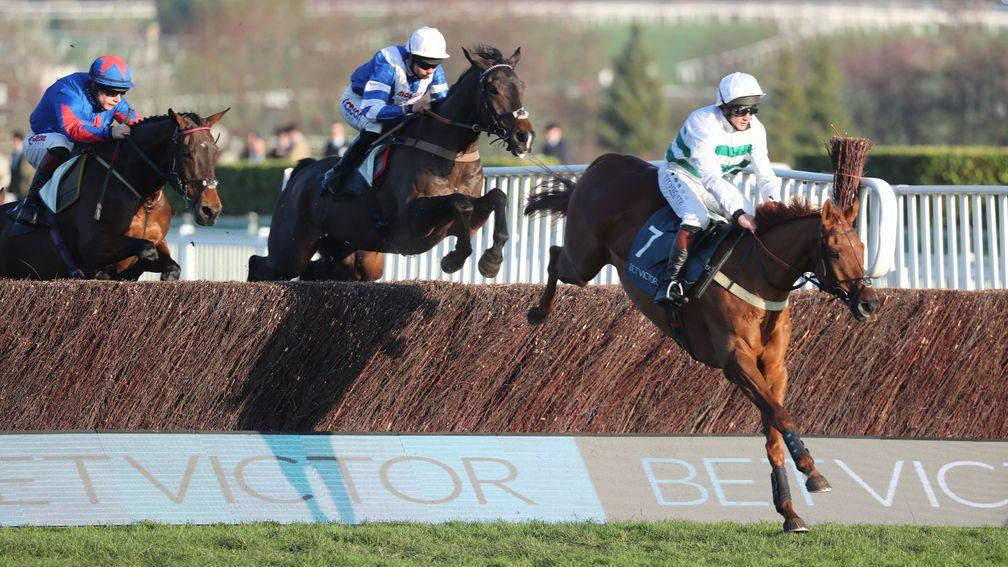 Baron Alco and Jamie Moore jump the last in front and go on to land the BetVictor Gold Cup at Cheltenham