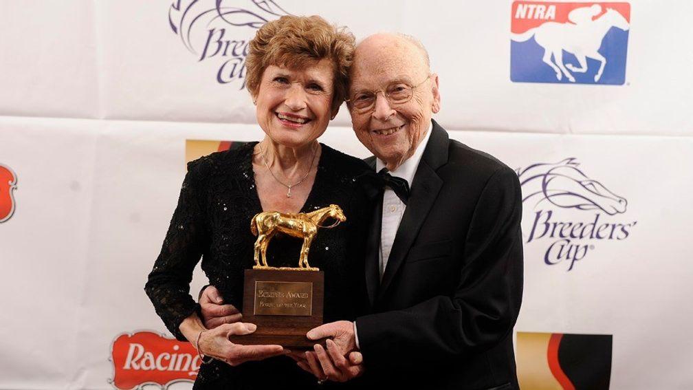 Morton and Elaine Fink in 2014 with their Eclipse Award for Horse of the Year with Wise Dan
