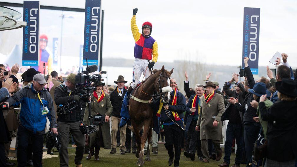 Native River and Richard Johnson walk in triumph into the winner's enclosure after the Cheltenham Gold Cup
