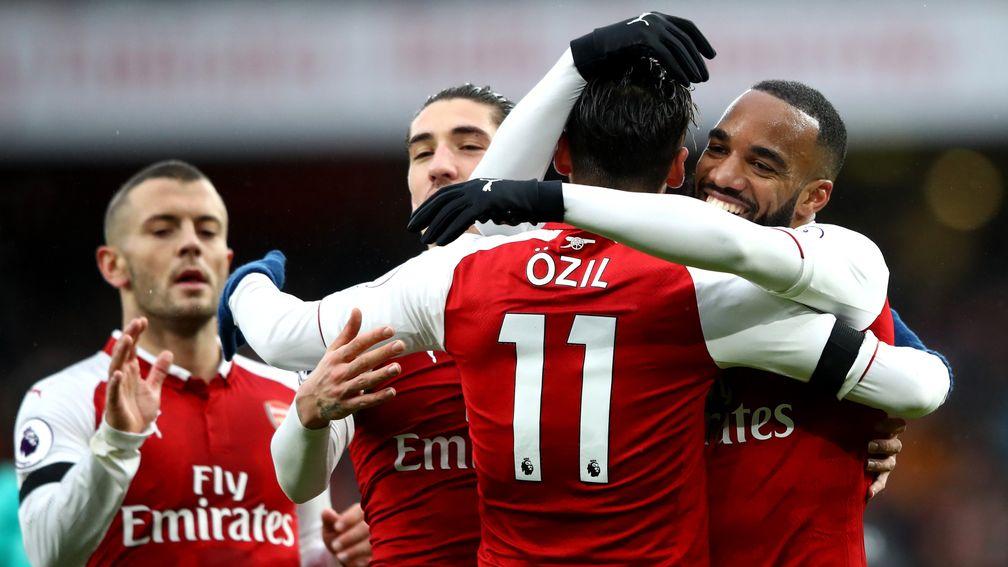 Alexandre Lacazette celebrates with Arsenal teammates against Crystal Palace