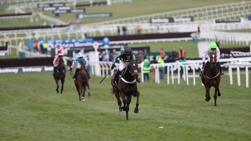 Altior (Nico de Boinville) pulls clear of Min for a third festival success in the Queen Mother Champion Chase