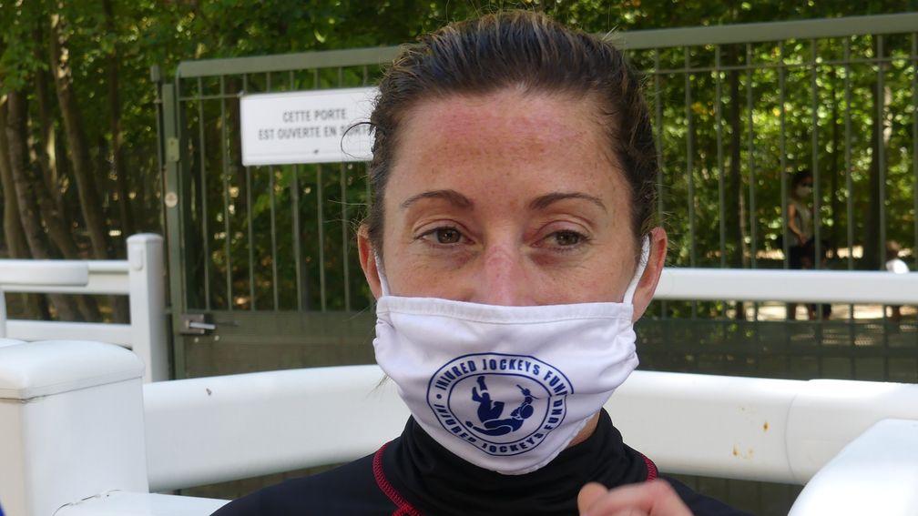 Support the cause: Hayley Turner sporting her Injured Jockeys Fund facemask at Chantilly on Sunday