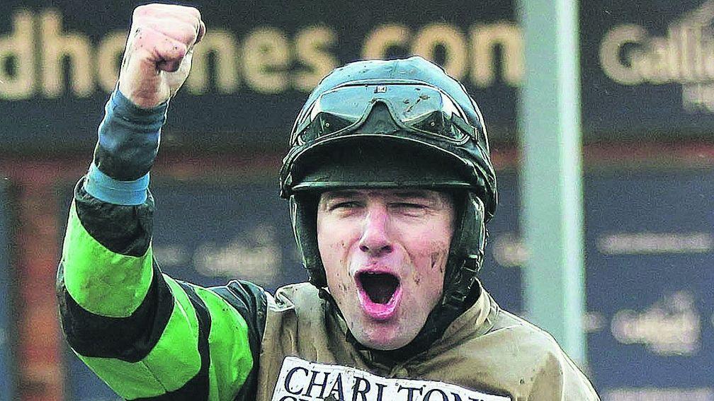 Jan Faltejsek celebrates in Cheltenham's winner's enclosure after Knockara Beau's Cleeve victory