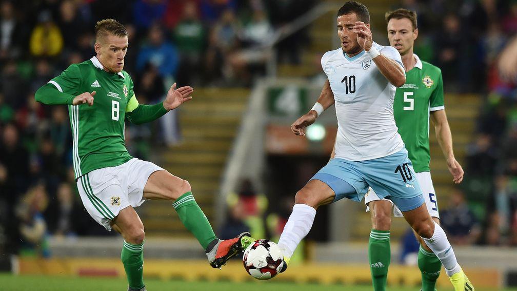 Israel striker Tomer Hemed battles for the ball against Northern Ireland