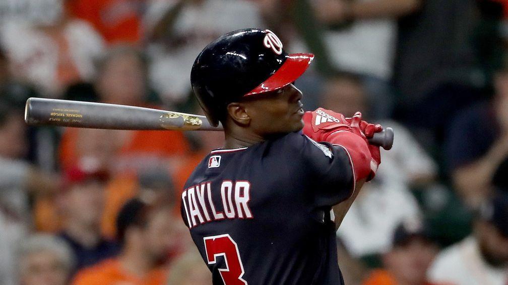 Michael A. Taylor of the Washington Nationals hits a home run against the Houston Astros in Game Two of the 2019 World Series