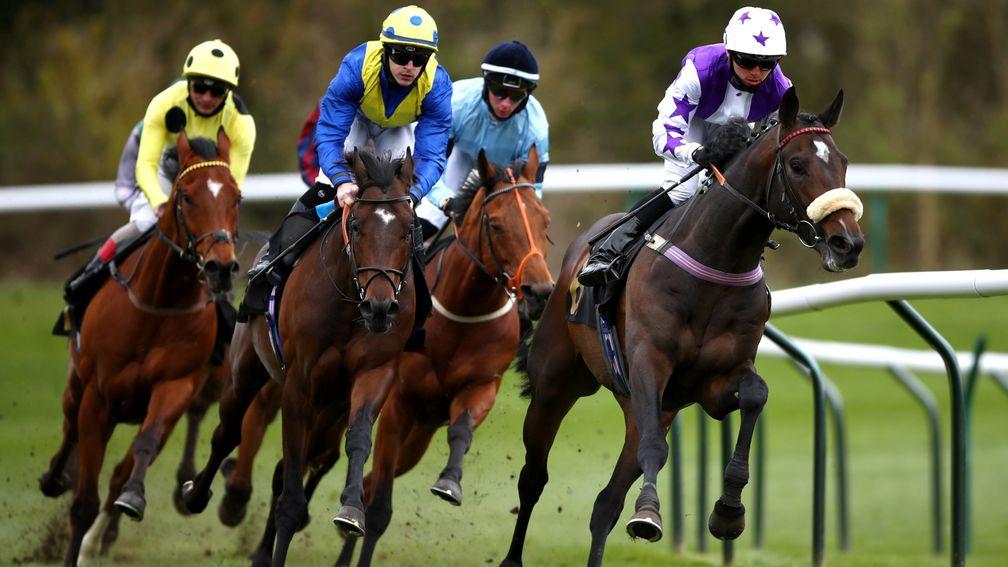 NOTTINGHAM, ENGLAND - APRIL 07: Astro King ridden by Richard Kingscote (second left) on their way to winning the Download The MansionBet App Handicap at Nottingham Racecourse, on April 7, 2021 in Nottingham, England. (Photo by Tim Goode - Pool/Getty Image