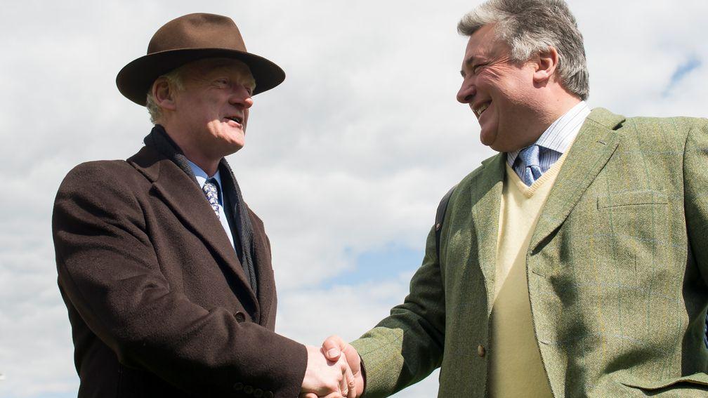 Willie Mullins and Paul Nicholls greet each other before the opening race of Sandown in 2016