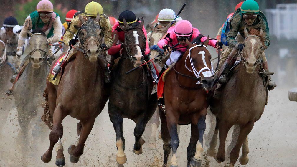 Maximum Security (second right) causes interference on the turn for home in the Kentucky Derby before being demoted. Runner-up Country House (left of front four) was awarded the race
