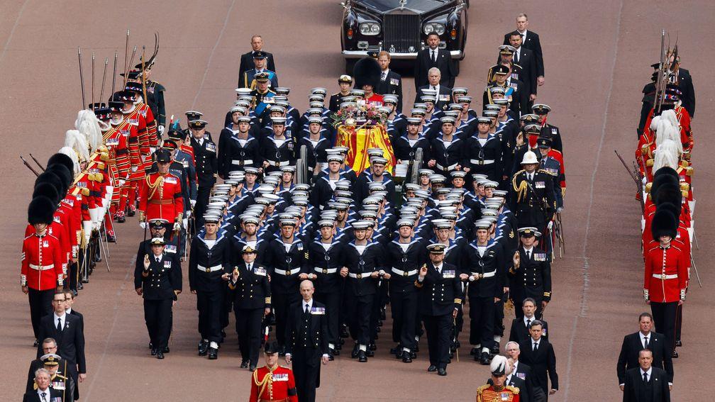 The Queen's funeral cortege is borne along the Mall by Royal Navy personnel