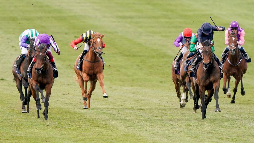 Mother Earth (left, purple) comes home strongest to win on the Rowley Mile