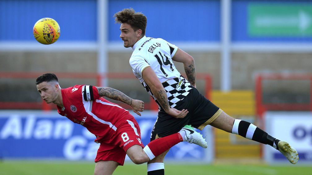 Stirling's William Robertson challenges Inverness's George Oakley