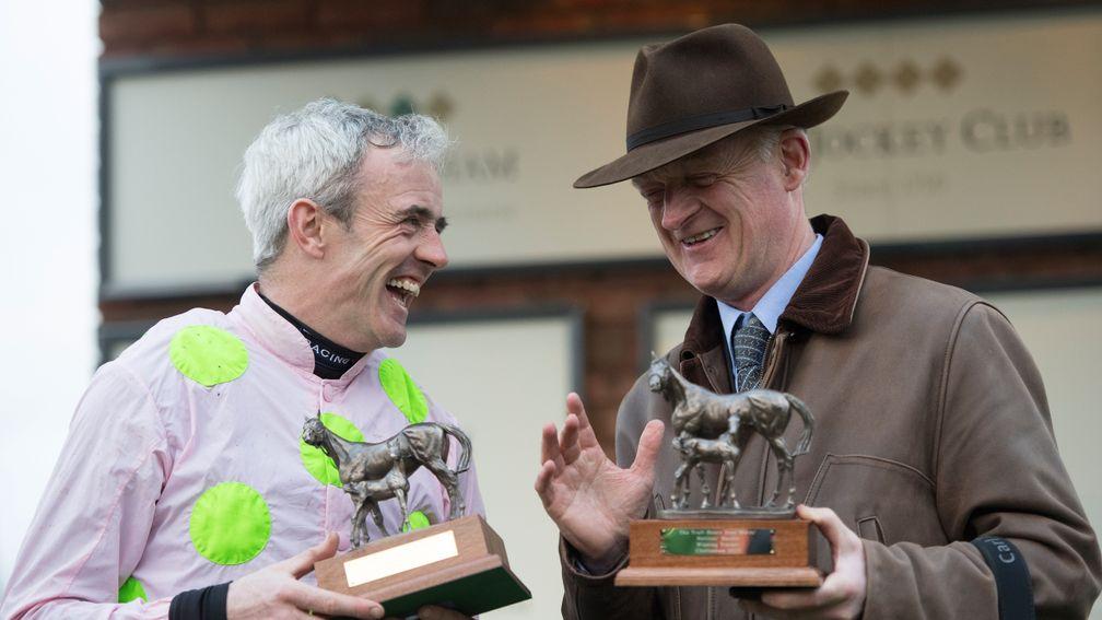 Men of the moment: Ruby Walsh and Willie Mullins after Let's Dance brought up their four-timer in the mares' novices' hurdle
