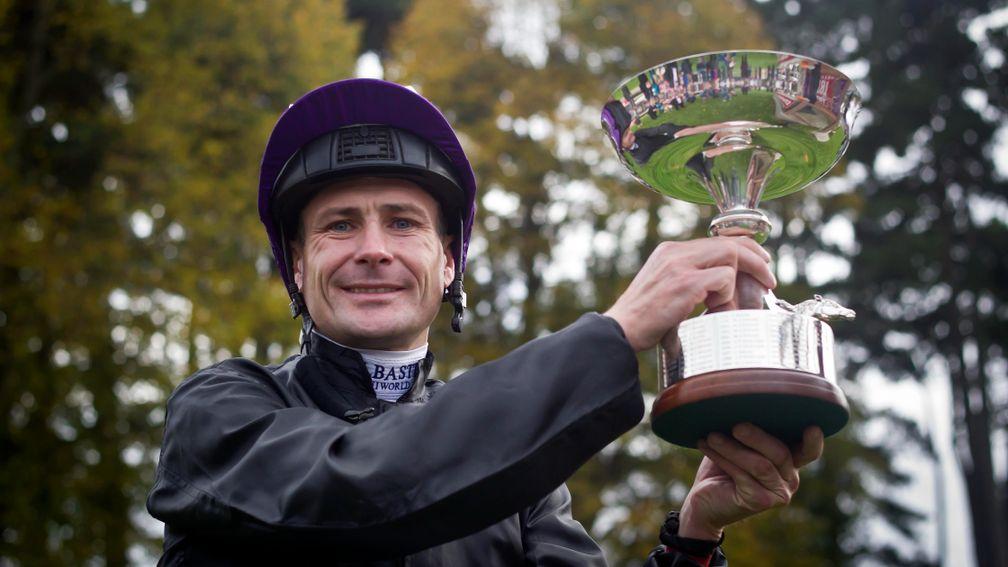 Pat Smullen lifts the trophy after the seventh of his nine Irish Flat jockeys' titles